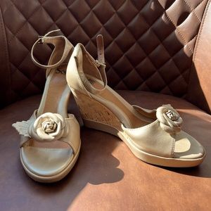 Open toe, 4” cork wedge sandals; ankle strap;leather platform